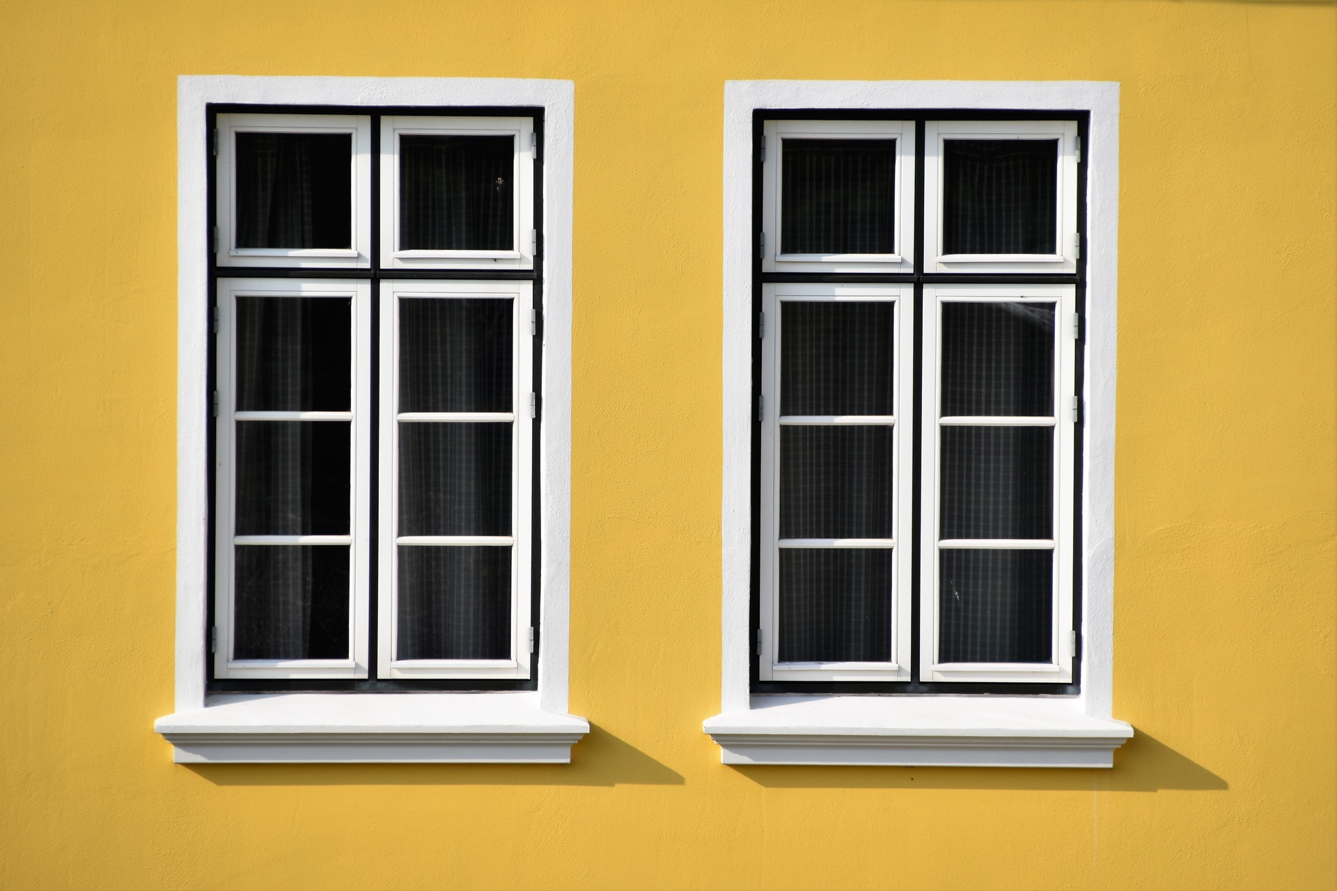 closed-white-wooden-framed-glass-windows-2290609.jpg